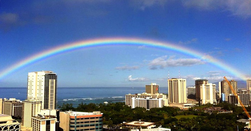 Hawaiian rainbow over Waikiki beach With Our Aloha