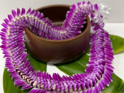 Edna lei with purple folded orchids