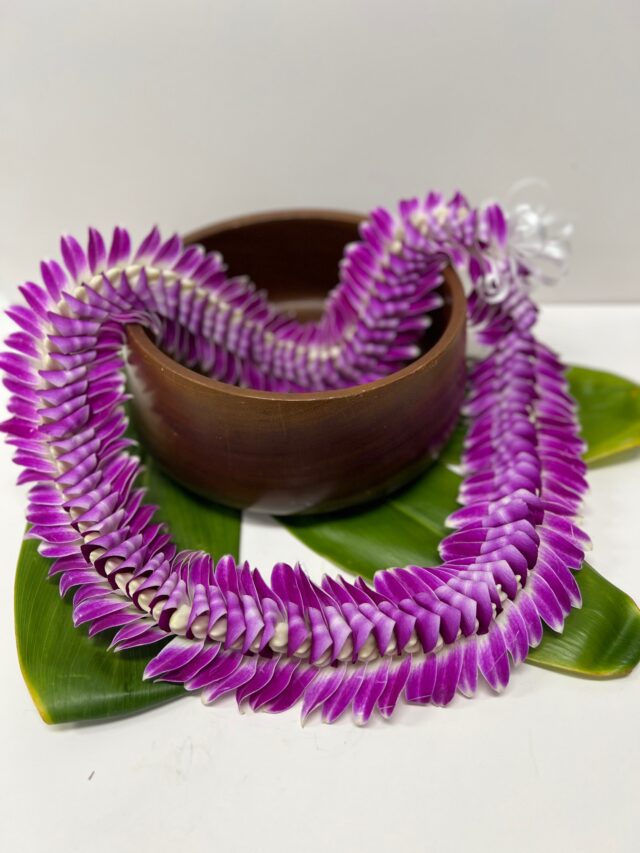 Edna lei with purple folded orchids